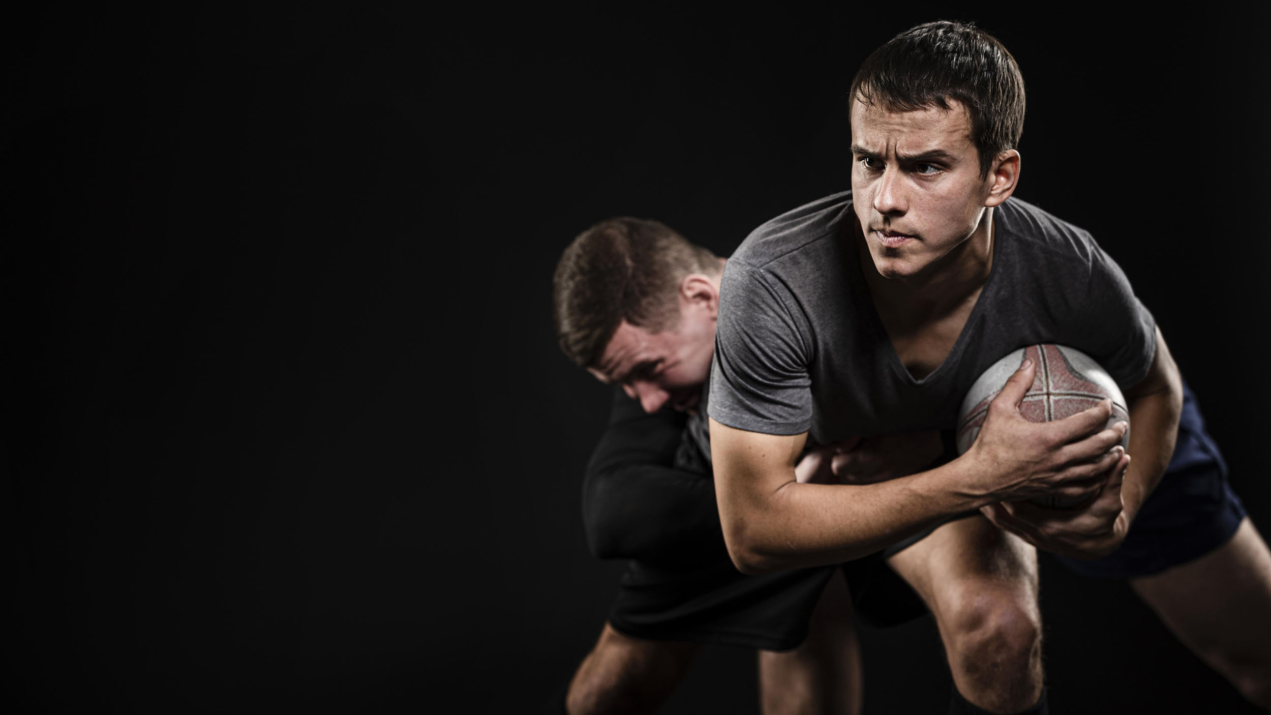 front-view-male-rugby-players-with-ball-copy-space-2