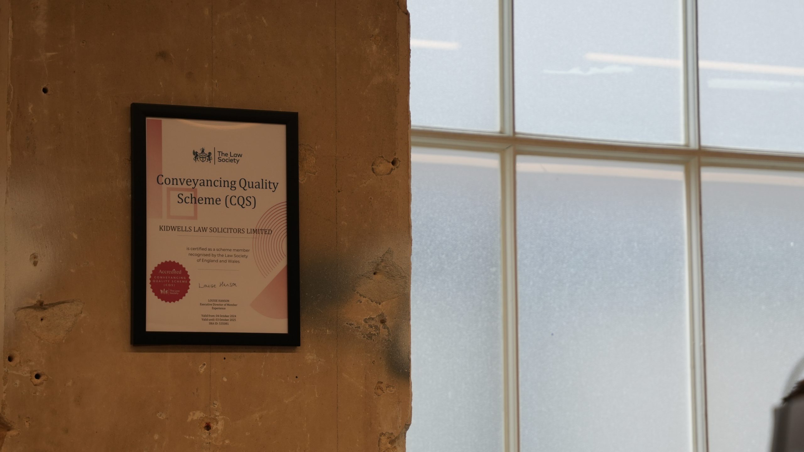 CQS certificate framed on a wall