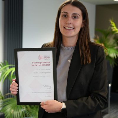 Caitlin with her certificate.